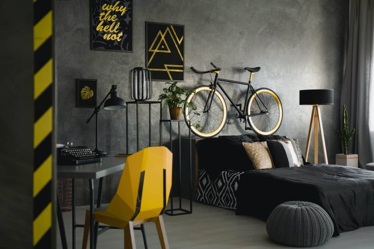 yellow-chair-at-desk-with-typewriter-in-dark-room-interior-with.jpg